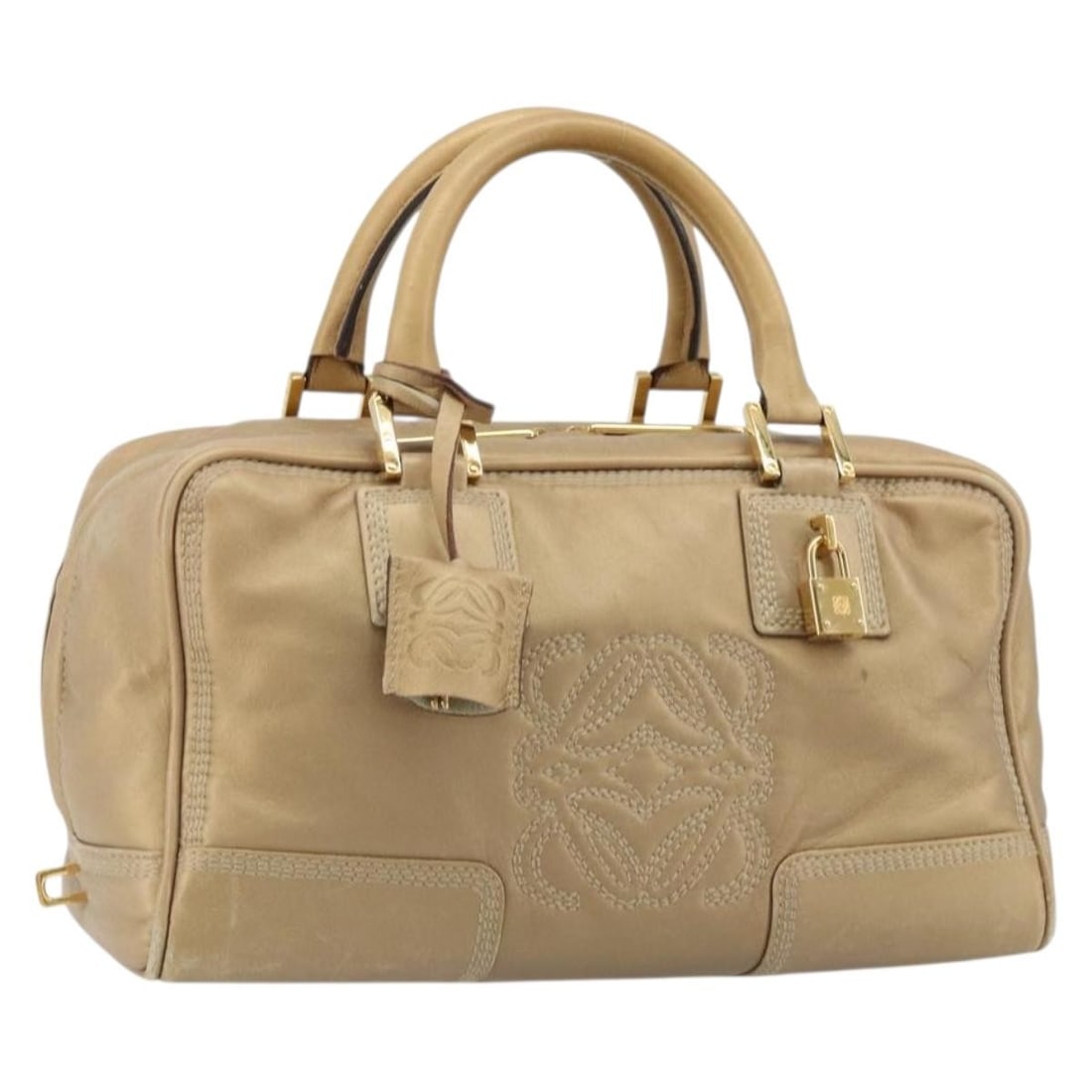 LOEWE Amazona 28 Gold Leather Handbag with Padlock Keys Clochette: LOEWE Amazona 28 Gold Leather Handbag with Padlock Keys Clochette LOEWE Amazona 28 handbag in gold leather, made in Spain. This women's handbag includes a padlock, two keys, and a clochette. Condition