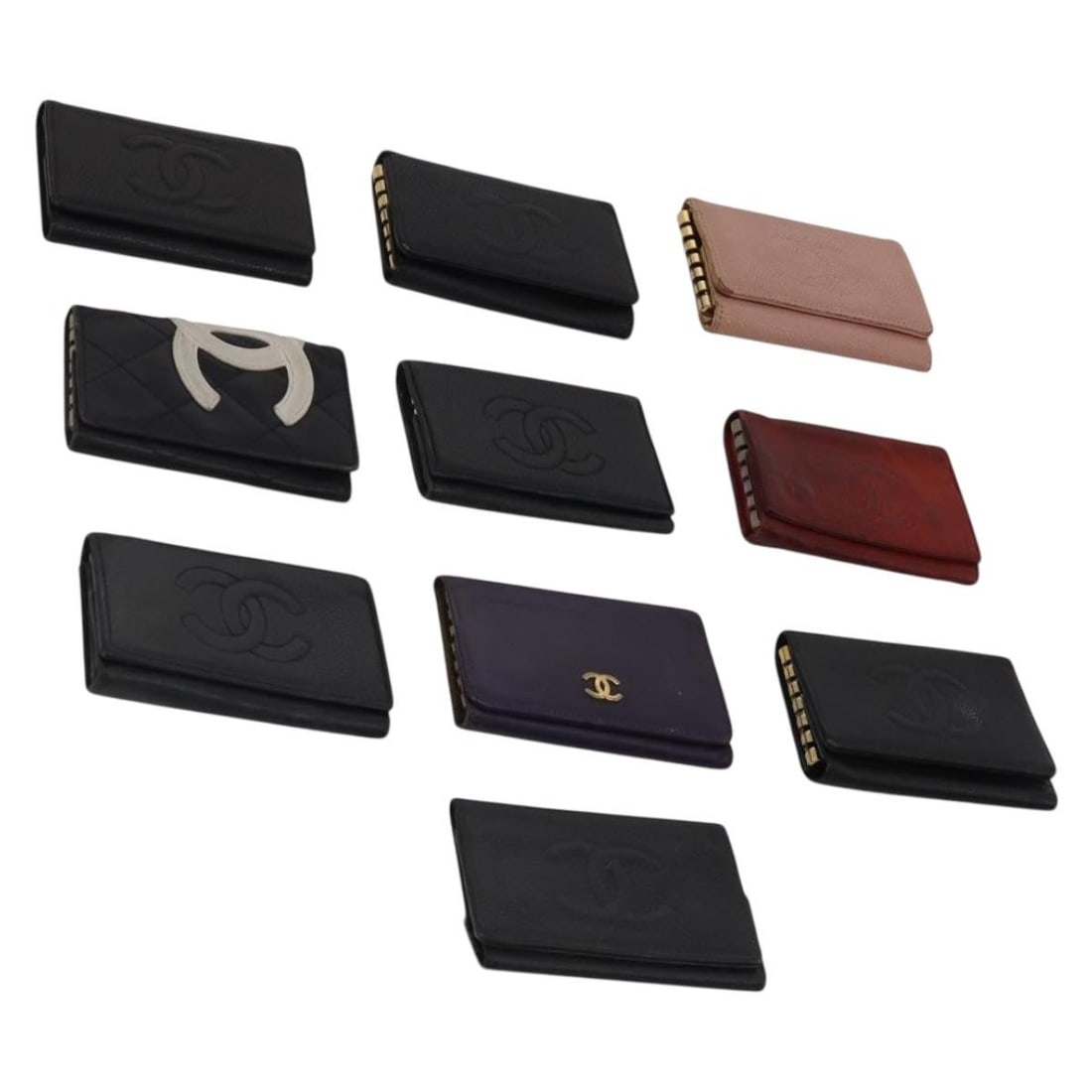 CHANEL leather key case pink black purple CC special set: CHANEL leather key case pink black purple CC special set CHANEL grained calfskin leather key case in pink, black, and purple. This women's key case is made in France and includes only the item shown. 