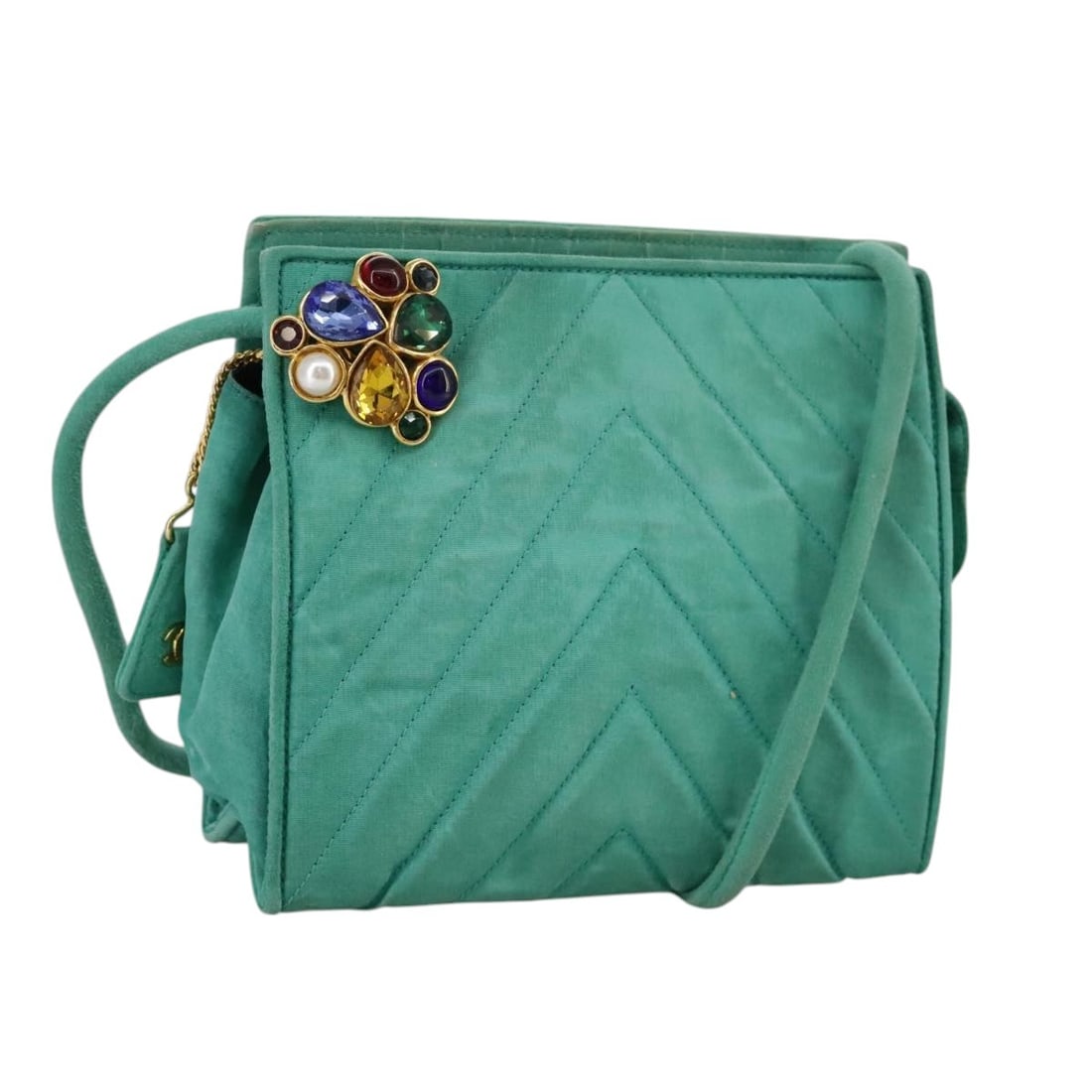 CHANEL Green Gold Nylon V Stitch Shoulder Bag Italy: CHANEL Green Gold Nylon V Stitch Shoulder Bag Italy This CHANEL V stitch shoulder bag is crafted from green and gold nylon, featuring the signature CC logo. Designed for women, it offers a compact sil