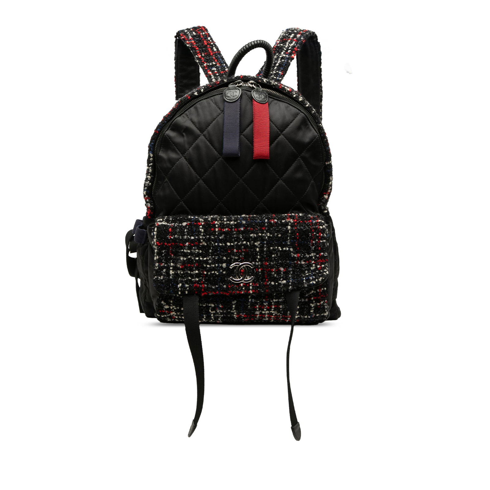 Chanel Astronaut Essentials Backpack in Quilted Nylon Tweed: Chanel Astronaut Essentials Backpack in Quilted Nylon Tweed Chanel Astronaut Essentials backpack crafted in quilted nylon and tweed with a top zip closure, rolled top handle, adjustable flat back stra