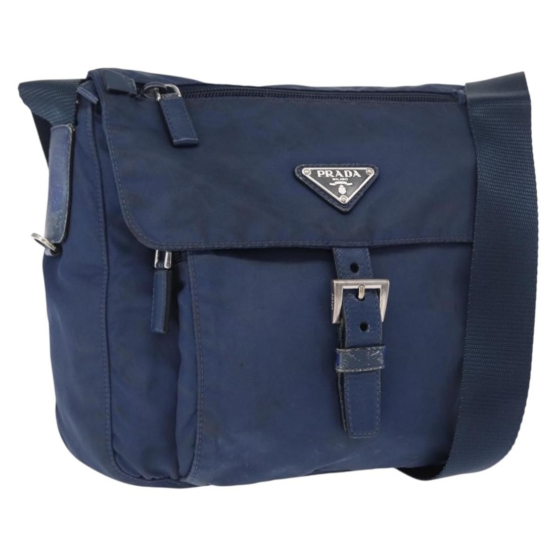 Navy Nylon PRADA Shoulder Bag with Silver Accents and Guarantee Card: Navy Nylon PRADA Shoulder Bag with Silver Accents and Guarantee Card This PRADA shoulder bag features a navy nylon exterior with silver-tone accents. Made in Italy, it offers a practical design with a