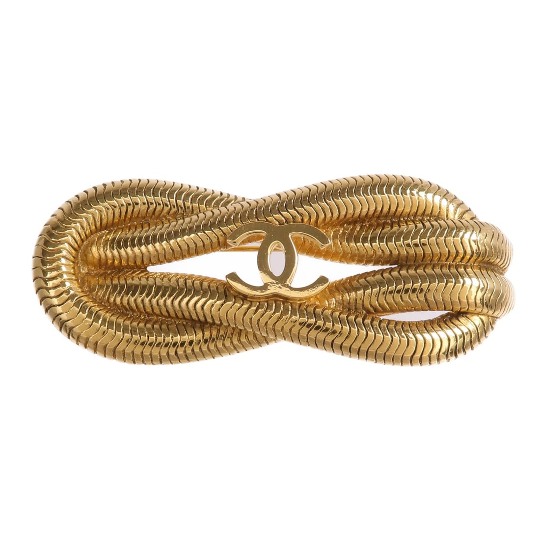 CHANEL CC Logo Brooch Gold Tone Metal France: CHANEL CC Logo Brooch Gold Tone Metal France CHANEL CC brooch in gold-tone metal, designed in a CC motif. It is a women's brooch made in France and is offered in very good AB condition. Accessories ar