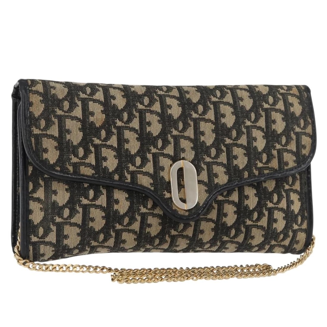 Christian Dior Trotter Shoulder Bag in Navy Gold Canvas: Christian Dior Trotter Shoulder Bag in Navy Gold Canvas Christian Dior shoulder bag in navy and gold Trotter canvas, made in France. This women's bag includes a shoulder strap and is offered as the it