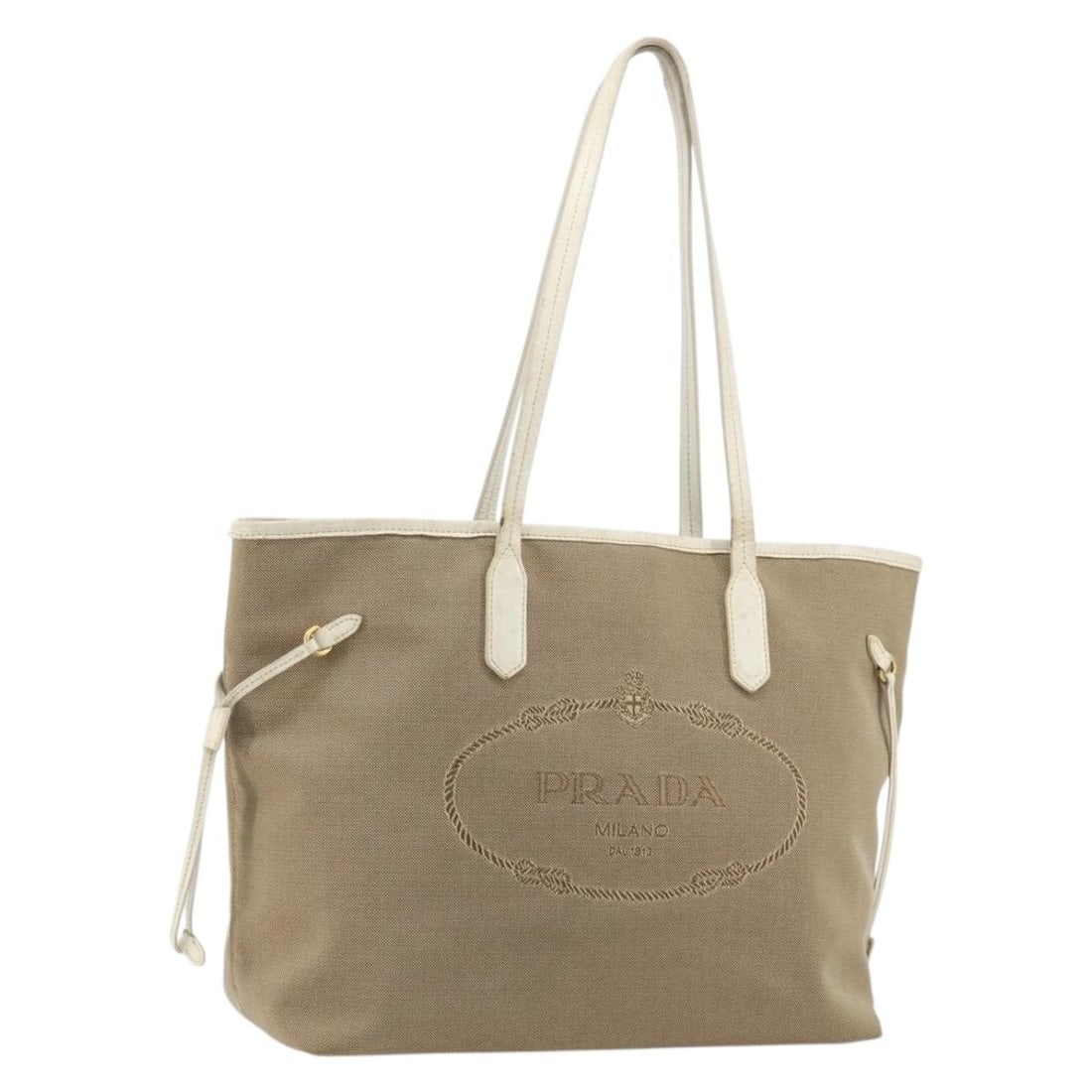 PRADA Beige Gold Canvas Tote Handbag Womens: PRADA Beige Gold Canvas Tote Handbag Womens Prada tote bag in beige and gold canvas. This women's bag was made in Turkey and includes only the item shown, with no box or dust bag. Condition is heavily