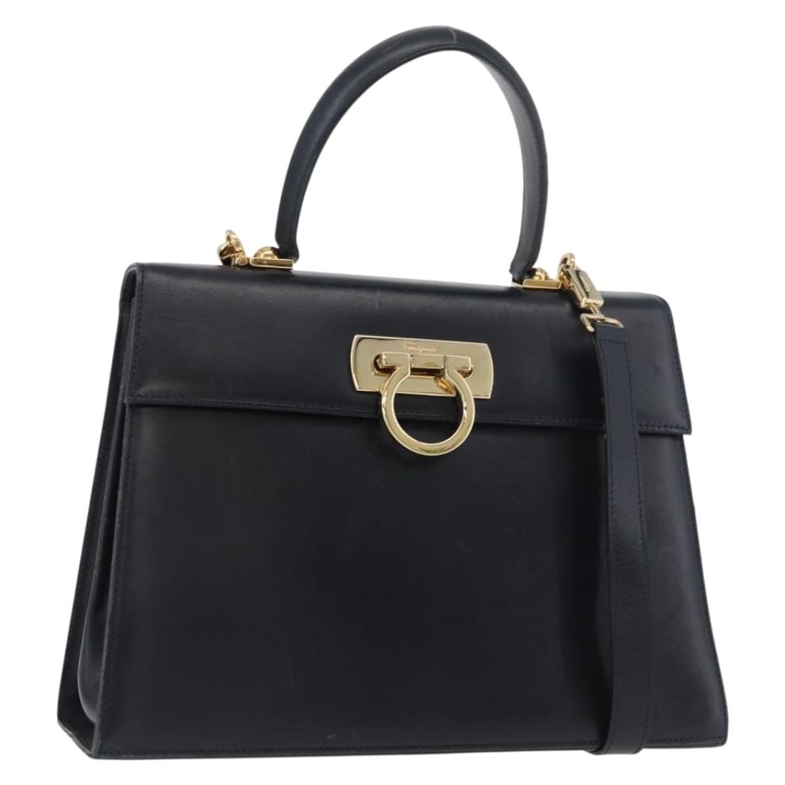 Salvatore Ferragamo Gancini Leather 2way Handbag Navy Gold Strap: Salvatore Ferragamo Gancini Leather 2way Handbag Navy Gold Strap Salvatore Ferragamo Gancini 2-way handbag in navy leather with gold-tone accents. Designed for women and made in Italy, this handbag in