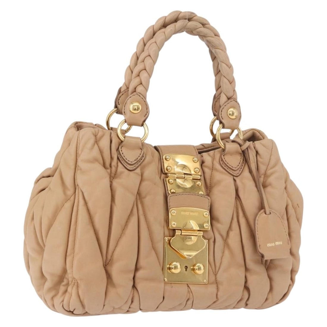 Miu Miu Matelasse Leather Handbag Beige Gold with Dust Bag: Miu Miu Matelasse Leather Handbag Beige Gold with Dust Bag Miu Miu matelasse handbag in beige leather with gold-tone accents. This women's handbag includes a dust bag, key, and clochette. Condition is