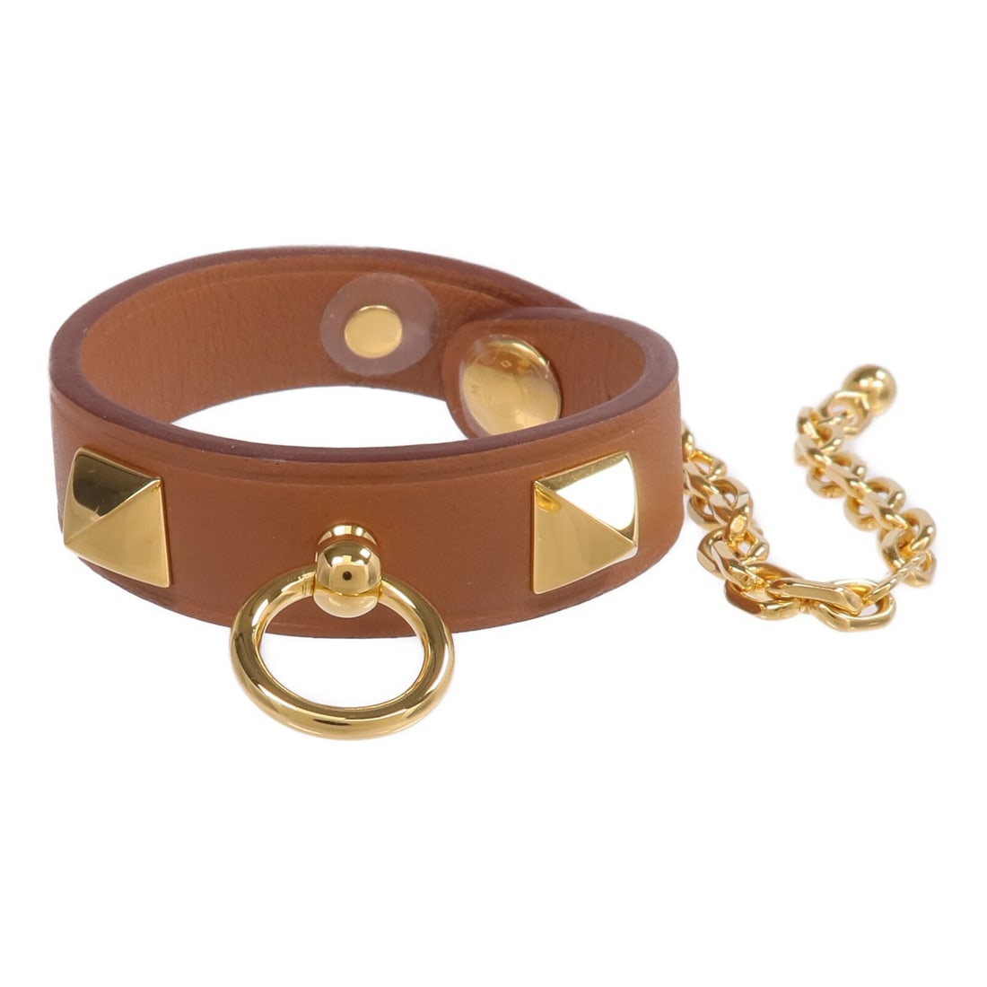 Hermes Rivale Glove Clip Brown Swift Calfskin Gold Tone: Hermes Rivale Glove Clip Brown Swift Calfskin Gold Tone An Hermes Rivale glove clip in gold and brown, crafted from Vaux Swift leather and calfskin (cowhide). It is a women's accessory made in France 