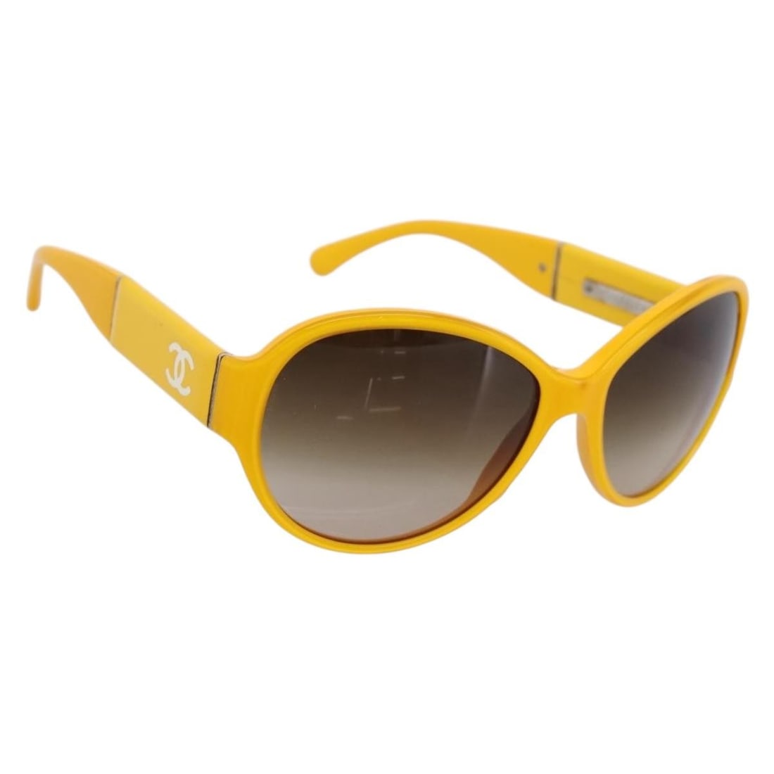 CHANEL Coco Mark Plastic Sunglasses Yellow Silver Italy: CHANEL Coco Mark Plastic Sunglasses Yellow Silver Italy Authentic Chanel Coco Mark sunglasses in yellow and silver plastic. This women's pair was made in Italy and shows reasonable wear from prior use