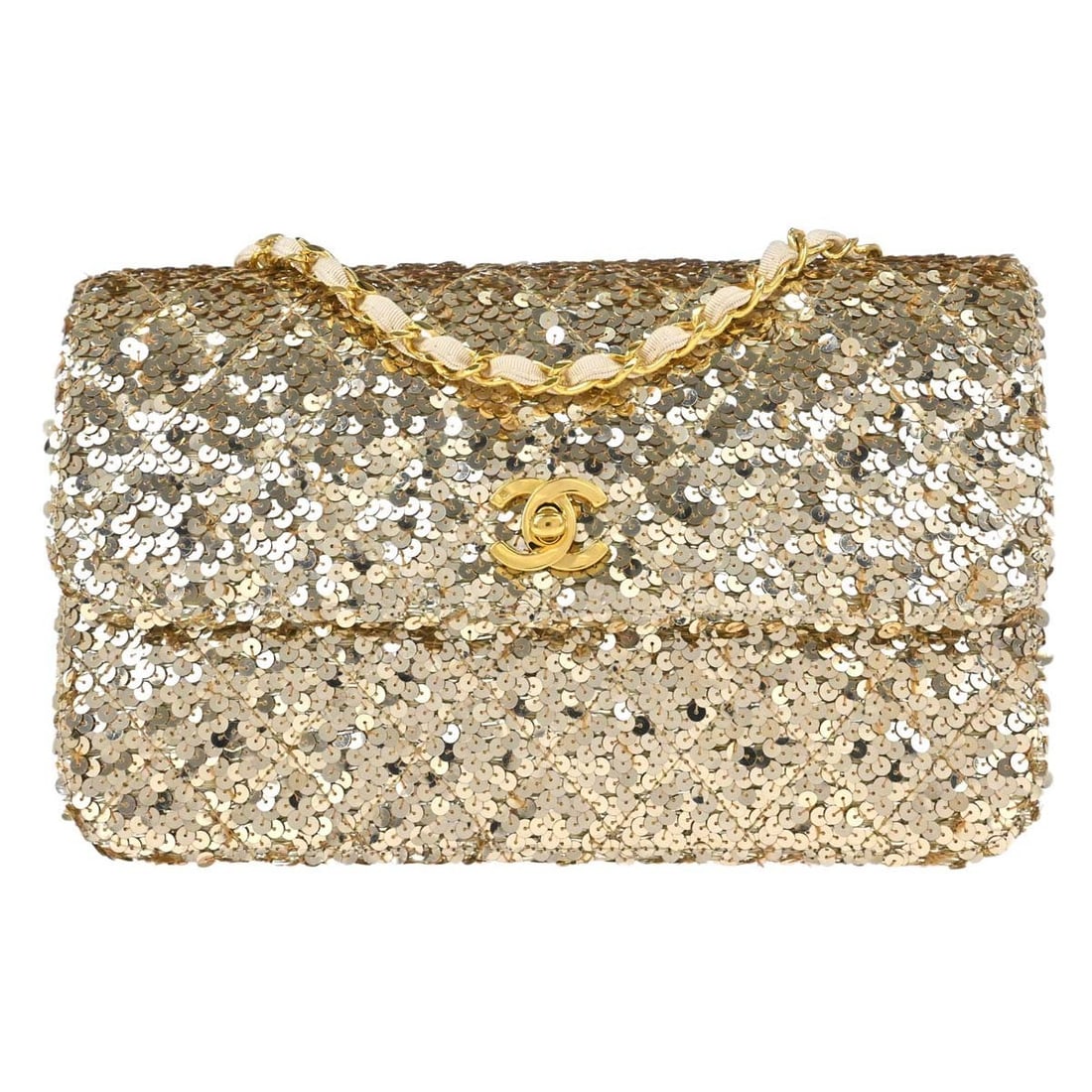 CHANEL Medium Shoulder Bag Gold Sequin Canvas Turn Lock: CHANEL Medium Shoulder Bag Gold Sequin Canvas Turn Lock This Chanel shoulder bag is crafted in gold sequins with a beige crossbody strap and beige exterior details. It features a turn lock closure, a 