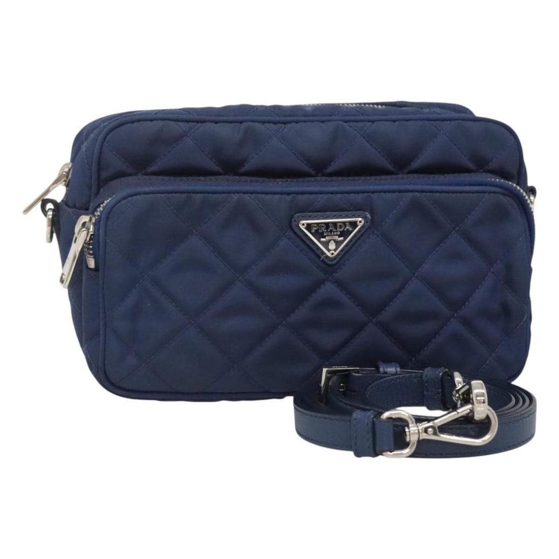 PRADA Blue Nylon Shoulder Bag with Silver Tone Hardware: PRADA Blue Nylon Shoulder Bag with Silver Tone Hardware Prada quilted shoulder bag in blue nylon with silver-tone accents. Made in Italy, this women's bag includes the item only; the item box and dust