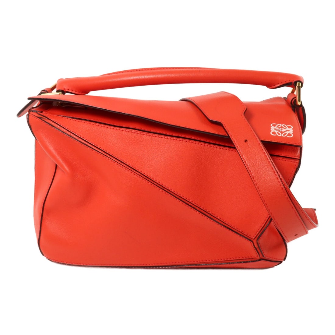 LOEWE Puzzle Medium 2way Shoulder Bag Red Calfskin Leather: LOEWE Puzzle Medium 2way Shoulder Bag Red Calfskin Leather Medium Loewe Puzzle 2-way shoulder bag in red calfskin leather. This women's bag features a structured design with both handle and shoulder s