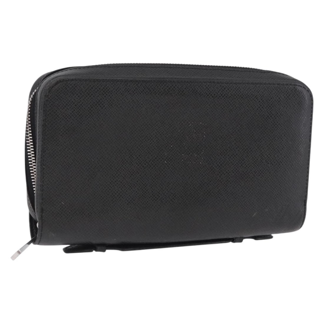 Louis Vuitton M44275 Zippy XL Taiga Leather Long Wallet Black: Louis Vuitton M44275 Zippy XL Taiga Leather Long Wallet Black Louis Vuitton Taiga Zippy XL long wallet in black Taiga leather. This heavily used wallet shows visible wear throughout, including rubbing