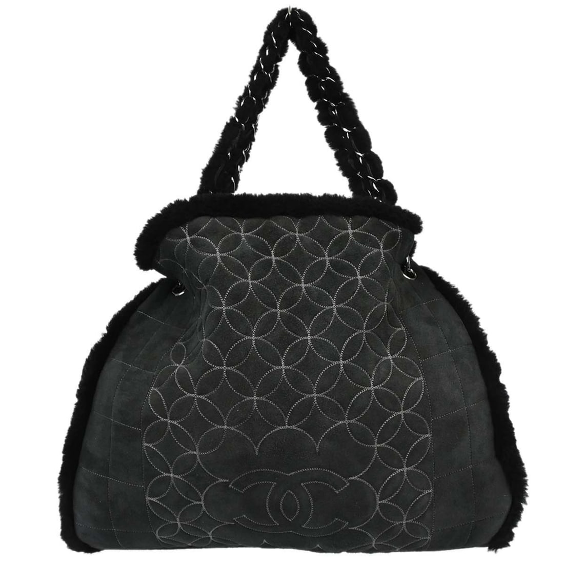 CHANEL Choco Bar large black mouton tote bag with pouch: CHANEL Choco Bar large black mouton tote bag with pouch Large Chanel tote handbag in black mouton fur with double handles and a magnetic closure. Made in Italy, this bag includes a pouch, serial stick