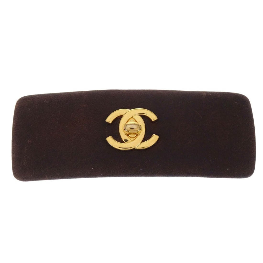 CHANEL Turnlock Leather Barrette Brown Gold Plated France: CHANEL Turnlock Leather Barrette Brown Gold Plated France Chanel turnlock barrette hair clip in brown leather with gold-plated metal. Made in France, this hair accessory features a classic barrette fo