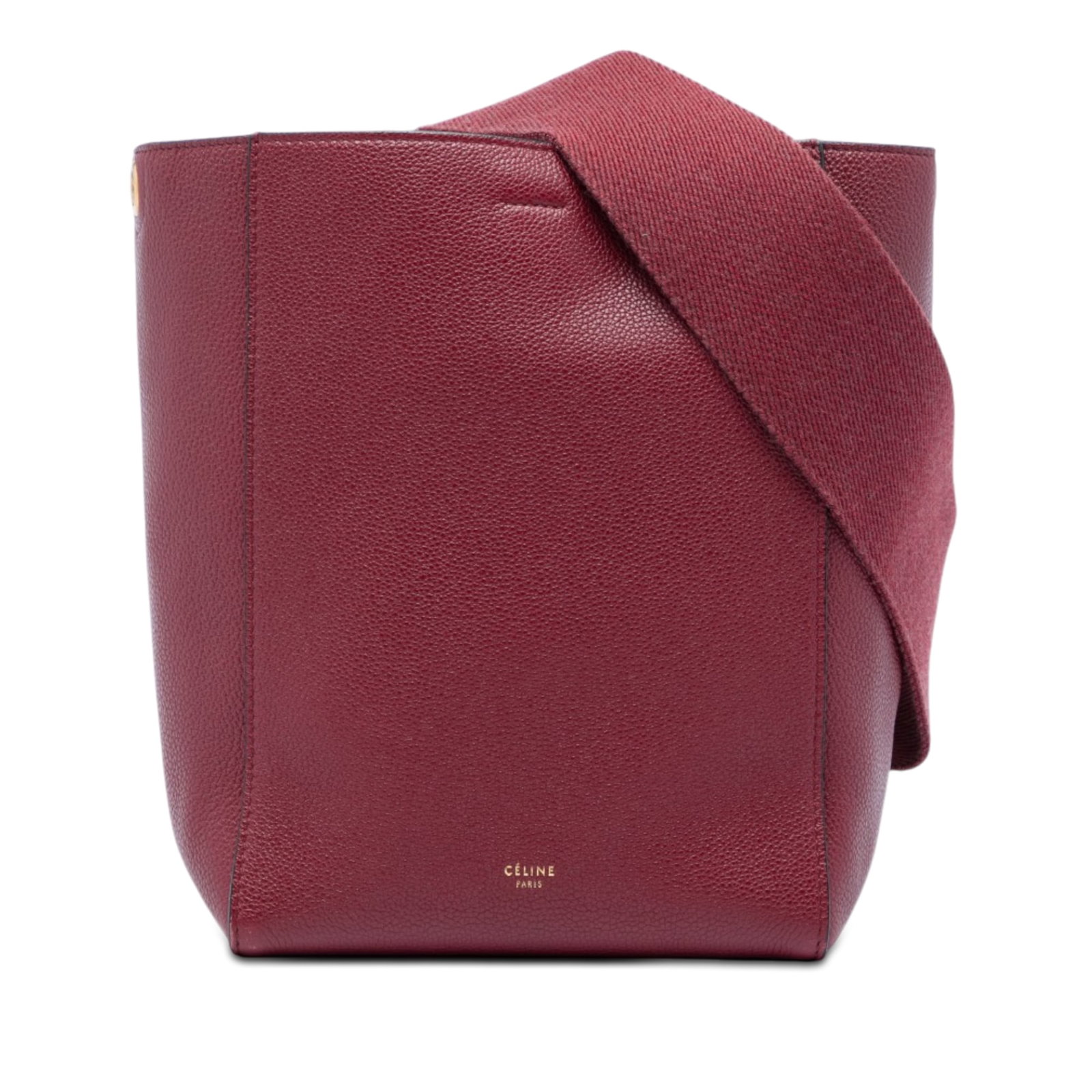 Celine Seau Sangle Small Red Leather Bucket Bag: Celine Seau Sangle Small Red Leather Bucket Bag Celine Seau Sangle bucket bag crafted in red leather with a detachable flat canvas strap, open top with hook closure, and interior zip and slip pockets.