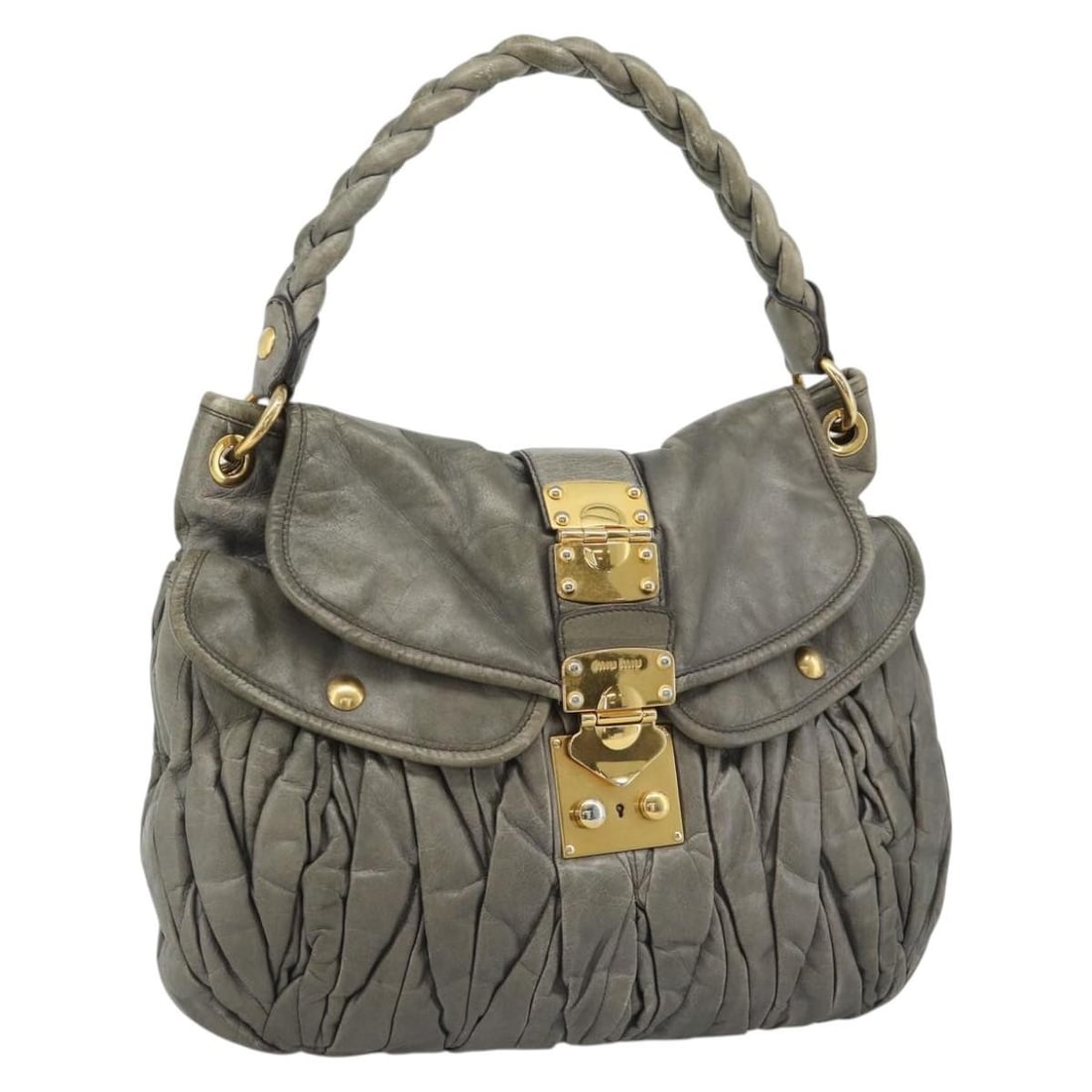 Miu Miu Gray Leather Shoulder Bag Gold Tone 194: Miu Miu Gray Leather Shoulder Bag Gold Tone 194 Miu Miu matelasse shoulder bag in gray leather with gold-tone accents. This women's shoulder bag is made in Turkey and includes only the bag shown; the 