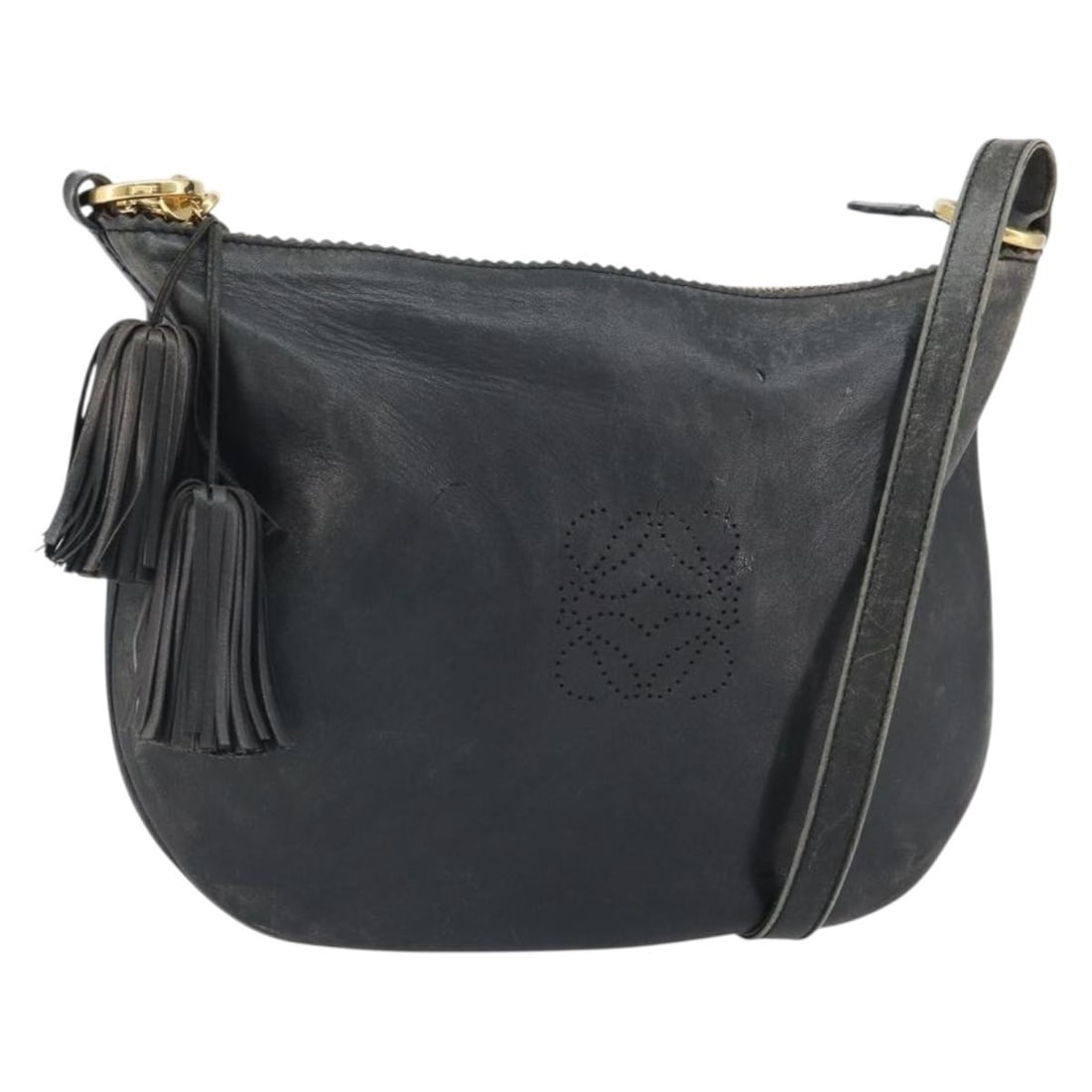Black and Gold Leather LOEWE Shoulder Bag Spain: Black and Gold Leather LOEWE Shoulder Bag Spain This LOEWE shoulder bag features black and gold leather with a slim profile and a long shoulder strap. Made in Spain, the bag exhibits visible signs of 