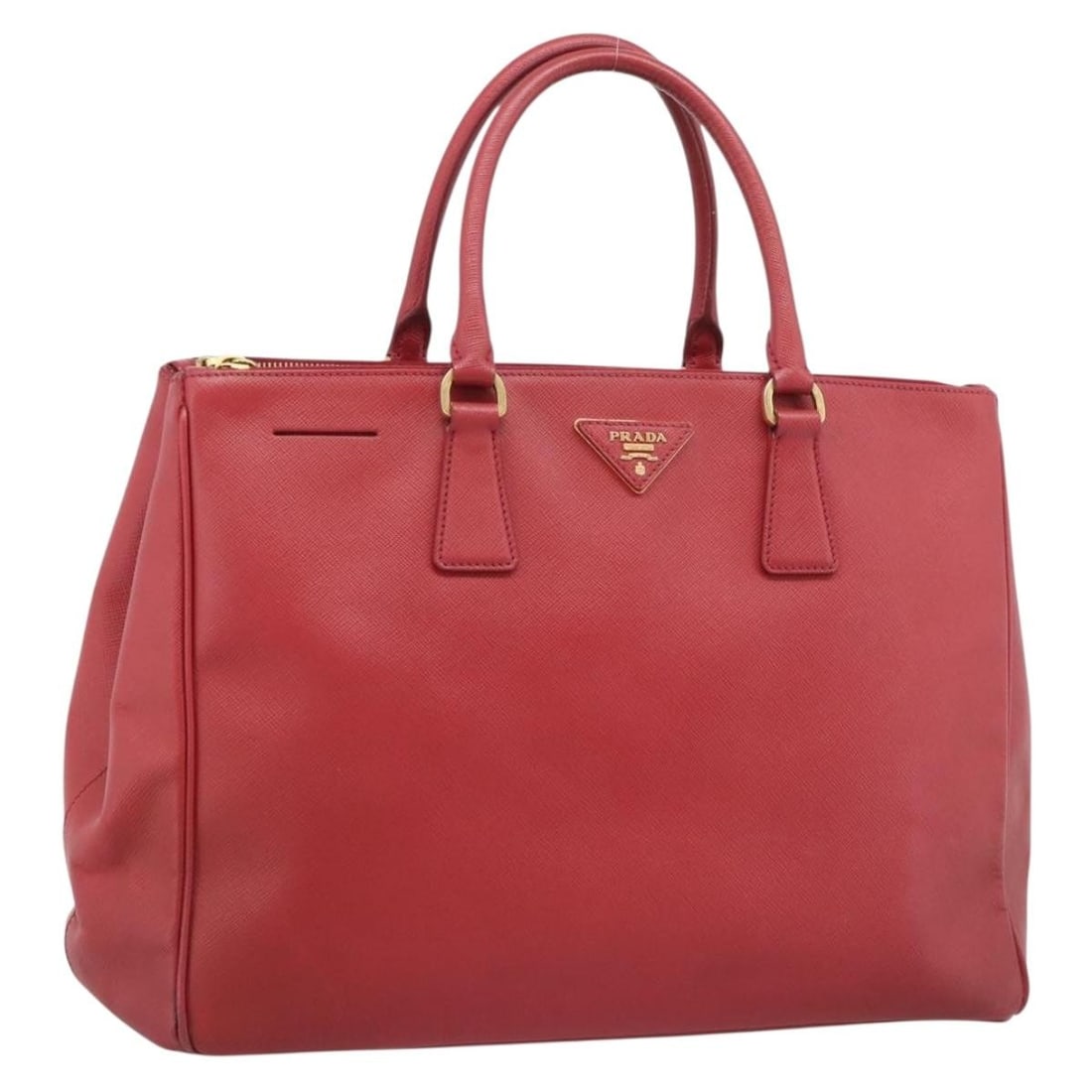 PRADA Saffiano Leather Hand Bag Red Italy: PRADA Saffiano Leather Hand Bag Red Italy Prada women's handbag in red Saffiano leather with gold-tone accents, made in Italy. This bag is offered without the original item box or dust bag; only the i