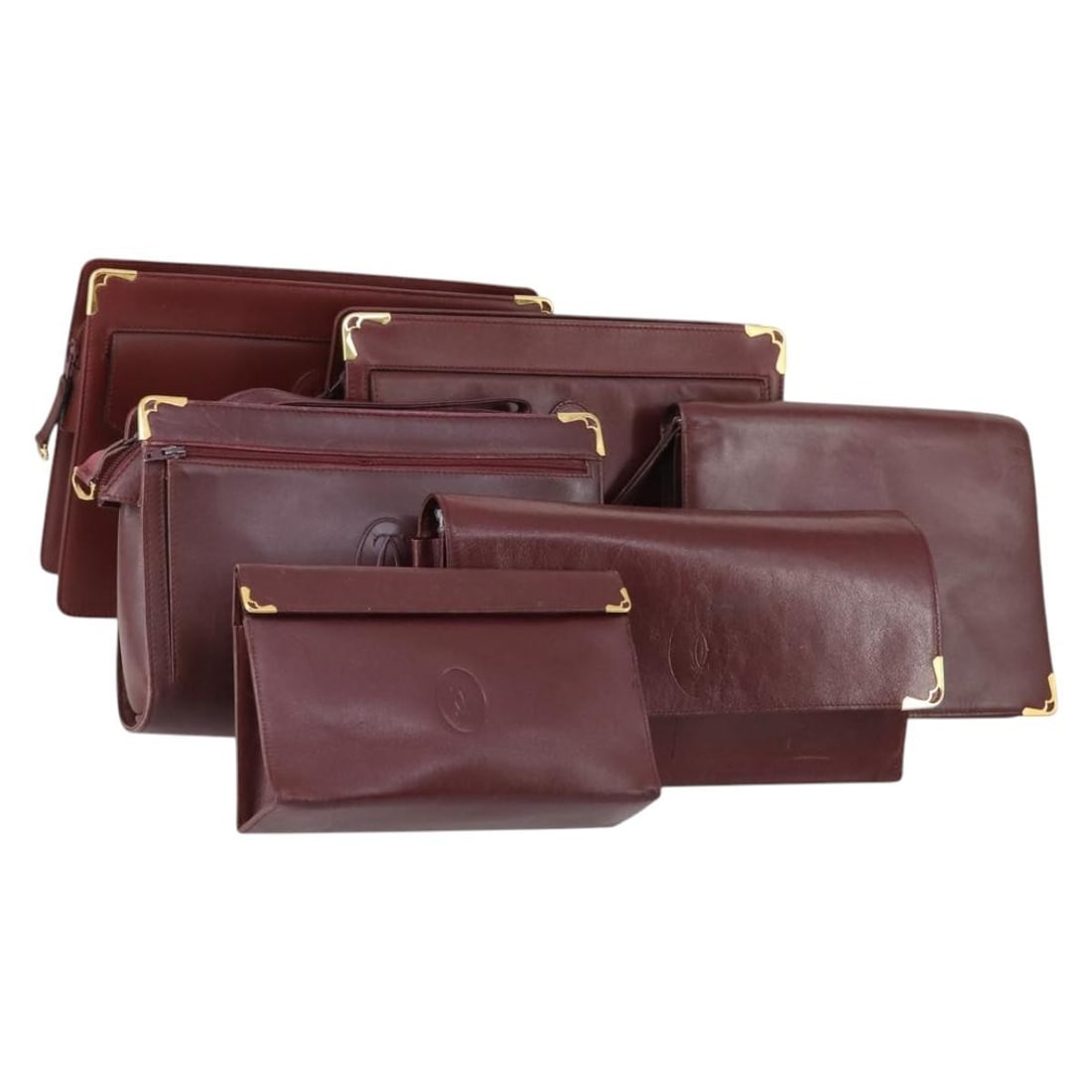 CARTIER Must Line Bordeaux Leather Clutch Bag Set with Dust Bag Auth: CARTIER Must Line Bordeaux Leather Clutch Bag Set with Dust Bag Auth This exquisite CARTIER Must Line Clutch Bag is crafted from luxurious leather in a striking Bordeaux and Gold color combination. De