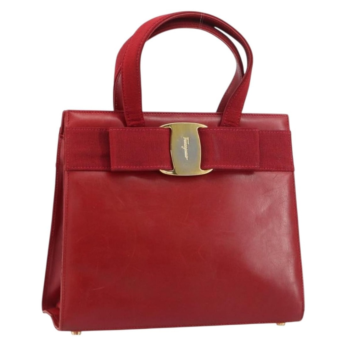 Salvatore Ferragamo Vala Red Gold Leather Hand Bag Italy: Salvatore Ferragamo Vala Red Gold Leather Hand Bag Italy This Salvatore Ferragamo Vala Hand Bag combines luxurious leather with a striking red and gold color scheme, showcasing the brand's Italian cra