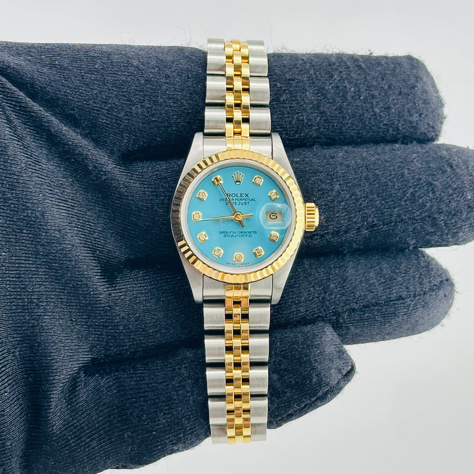 Rolex 69173 Datejust Lady watch with D-Link Jubilee bracelet: Rolex 69173 Datejust Lady watch with D-Link Jubilee bracelet Rolex Datejust Lady wristwatch featuring a champagne stick dial, fluted bezel, and D-Link Jubilee bracelet. This ladies model is identified