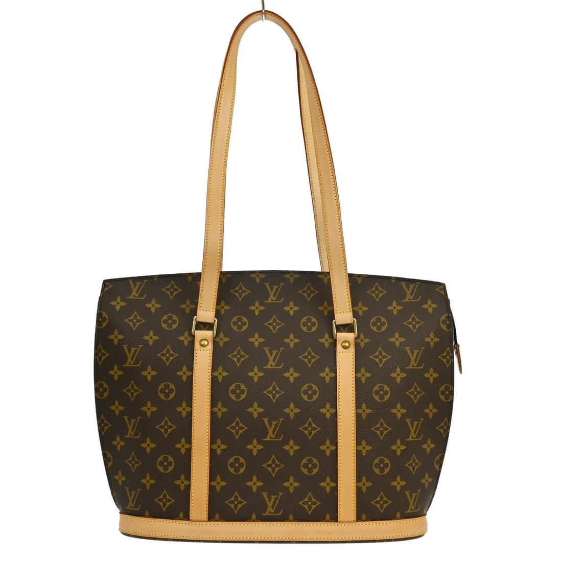 Louis Vuitton Babylone Monogram Canvas Large Tote M51102: Louis Vuitton Babylone Monogram Canvas Large Tote M51102 Vintage Louis Vuitton Babylone tote bag in brown Monogram canvas with leather trim and double handles. This zip-top handbag features a brown li