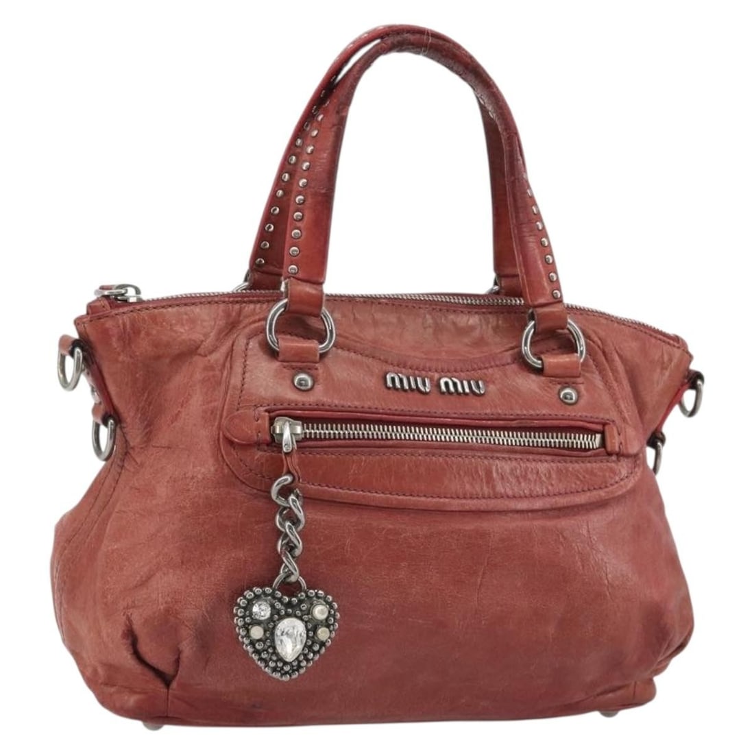 Miu Miu Red Leather Hand Bag Silver Tone Trim: Miu Miu Red Leather Hand Bag Silver Tone Trim This Miu Miu hand bag is crafted from leather in a red and silver colorway. It measures approximately 9.8 x 6.7 x 4.3 inches, with a handle drop of about 