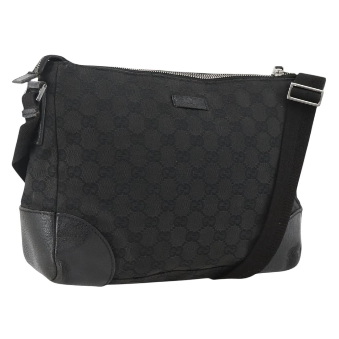Black GG Canvas Shoulder Purse by Gucci Model 114273 Silver Detail: Black GG Canvas Shoulder Purse by Gucci Model 114273 Silver Detail This is a Gucci GG Canvas shoulder bag in black and silver, designed for women. Crafted in Italy, the bag features the signature GG c