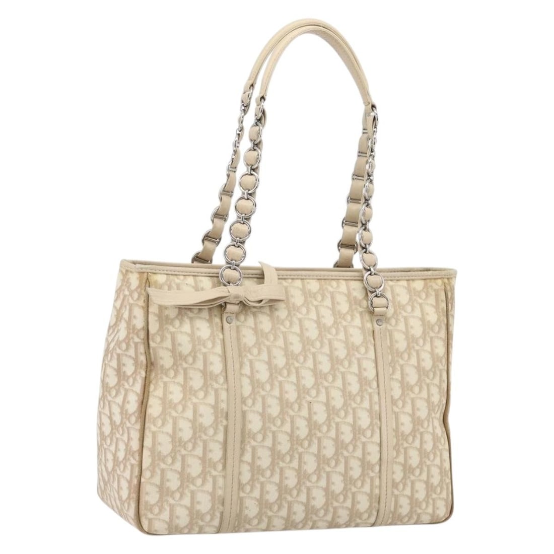 Christian Dior Romantic Chain PVC Leather Tote in Beige Silver: Christian Dior Romantic Chain PVC Leather Tote in Beige Silver Christian Dior Romantic Chain tote bag in beige and silver PVC leather. This women's tote is made in Italy and features a chain-handle de