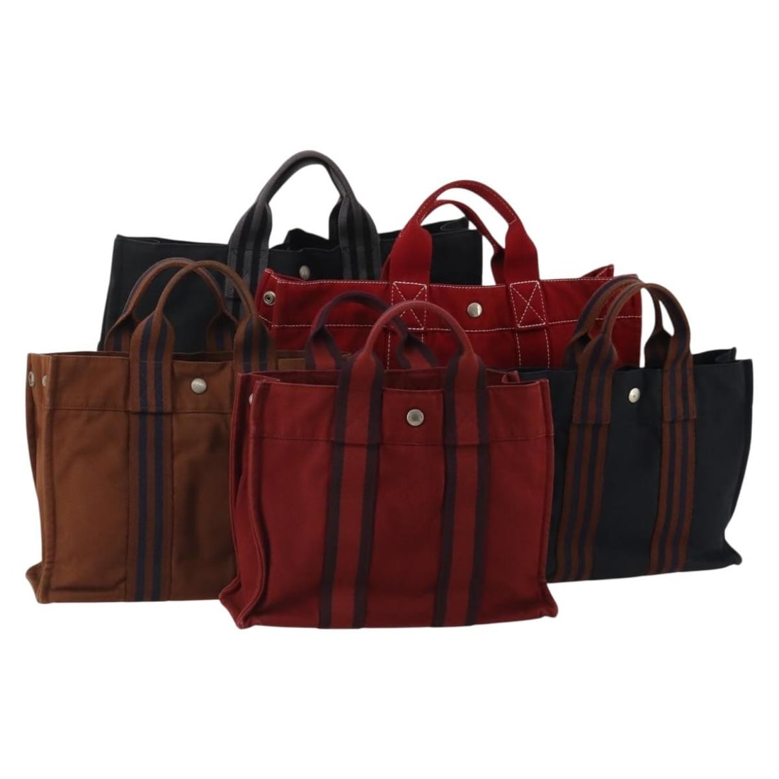 Set of 5 Hermes Fourre Tout cotton handbags in black red navy: Set of 5 Hermes Fourre Tout cotton handbags in black red navy Set of five Hermes Fourre Tout handbags in cotton with a black, red, and navy color palette. Made in France for women. This bundle include