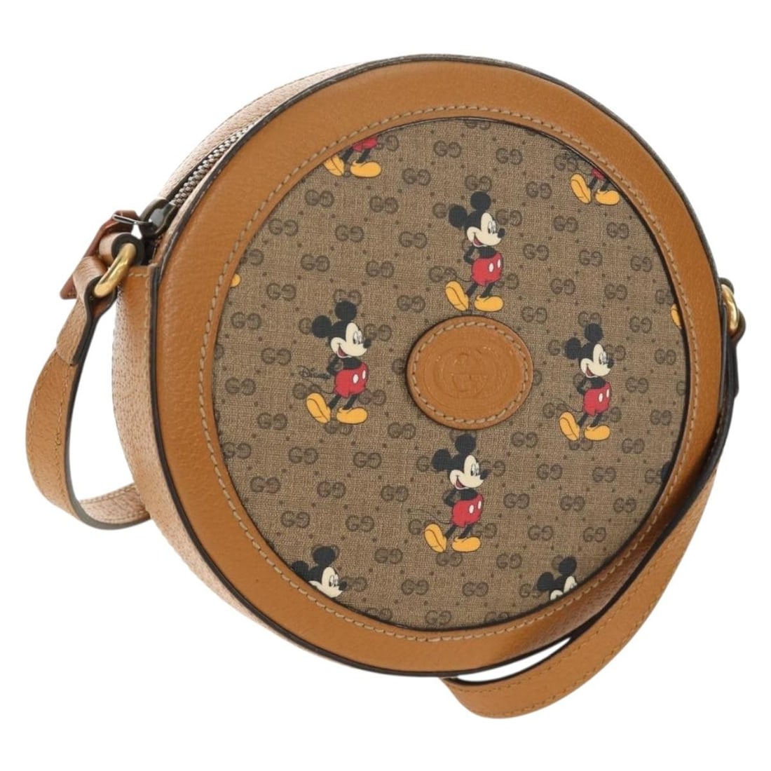 Gucci 603938 Disney Collaboration Micro GG Supreme Shoulder Bag Beige: Gucci 603938 Disney Collaboration Micro GG Supreme Shoulder Bag Beige A Gucci Micro GG Supreme Disney Collaboration shoulder bag in beige and gold, made from PVC leather and Micro Small GG canvas. It 