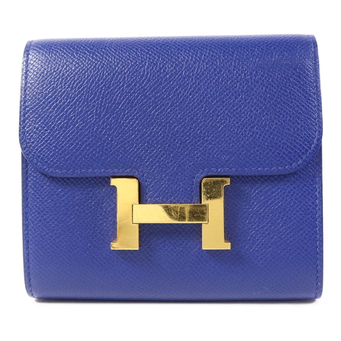 Hermes Constance Bi Fold Wallet Epsom Calfskin Bleu Electrique: Hermes Constance Bi Fold Wallet Epsom Calfskin Bleu Electrique Hermes Constance short bi-fold wallet in Epsom leather and calfskin (cowhide) with a Bleu Electrique blue colorway. It features a flap cl