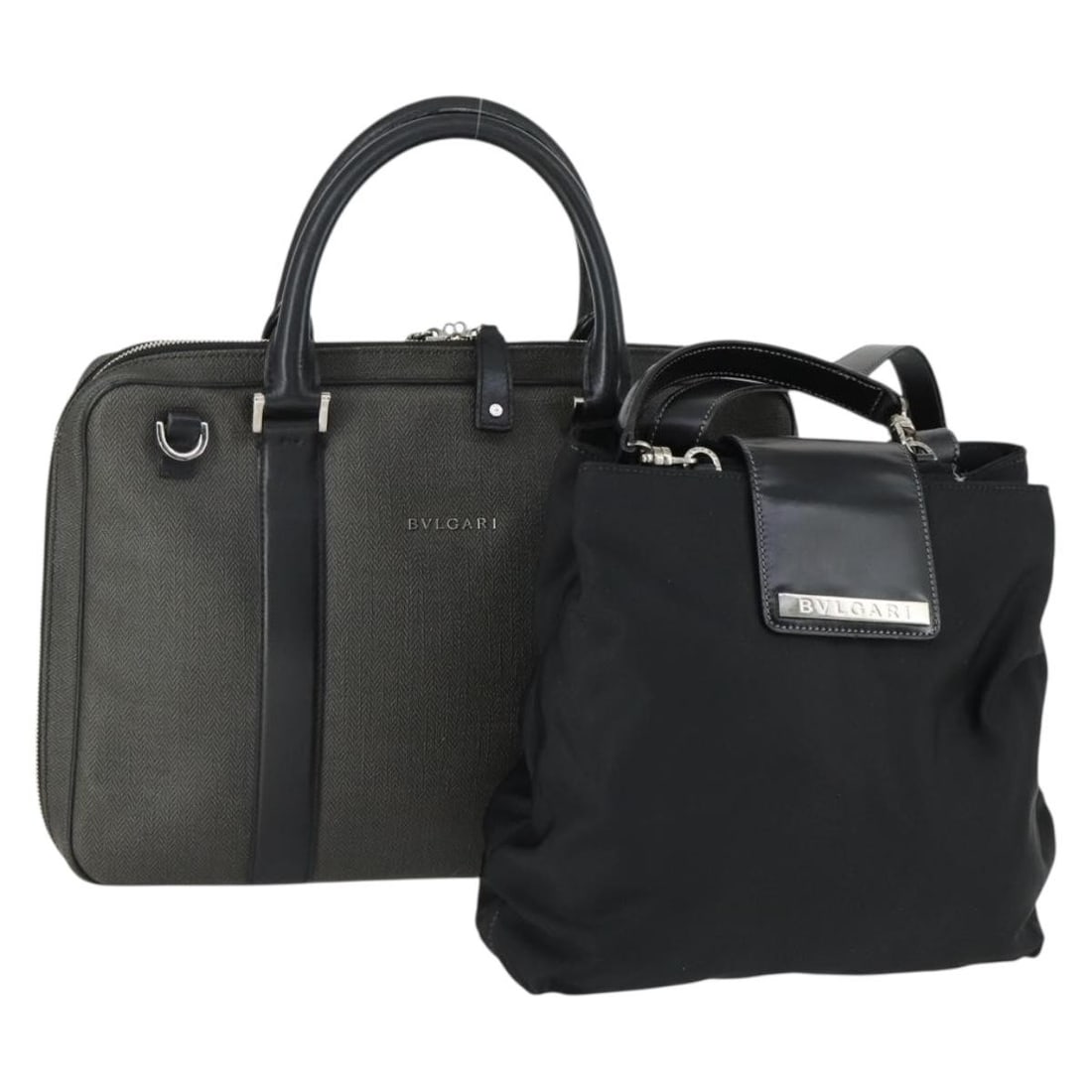 Set of 2 BVLGARI Black Canvas and Leather Shoulder Bags from Italy: Set of 2 BVLGARI Black Canvas and Leather Shoulder Bags from Italy This BVLGARI shoulder bag set features black canvas with leather accents and is made in Italy. The set is categorized as heavily used
