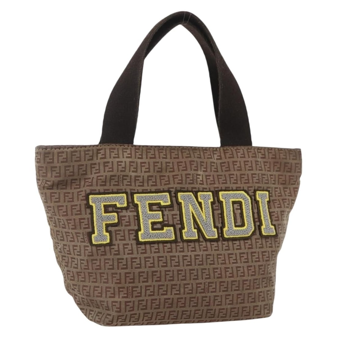 Fendi Zucchino Beige Silver Nylon Canvas Handbag Italy: Fendi Zucchino Beige Silver Nylon Canvas Handbag Italy This FENDI Zucchino Canvas handbag features a beige and silver nylon exterior with the signature Zucchino pattern. Designed for women, the bag is