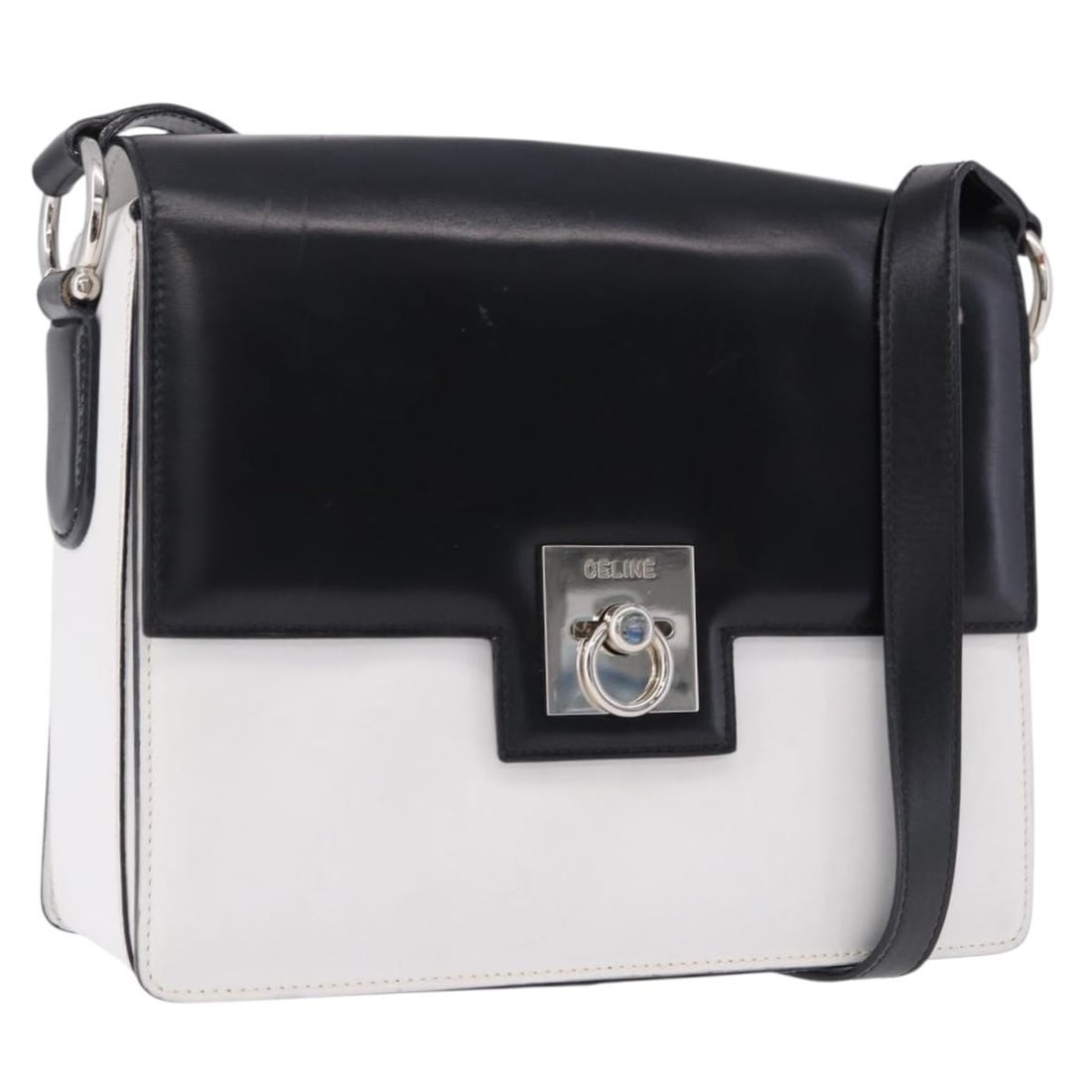 CELINE Black White Leather Womens Shoulder Bag Made in Italy: CELINE Black White Leather Womens Shoulder Bag Made in Italy Authentic CELINE shoulder bag in black and white leather. This women's bag was made in Italy and features an adjustable shoulder strap. It 