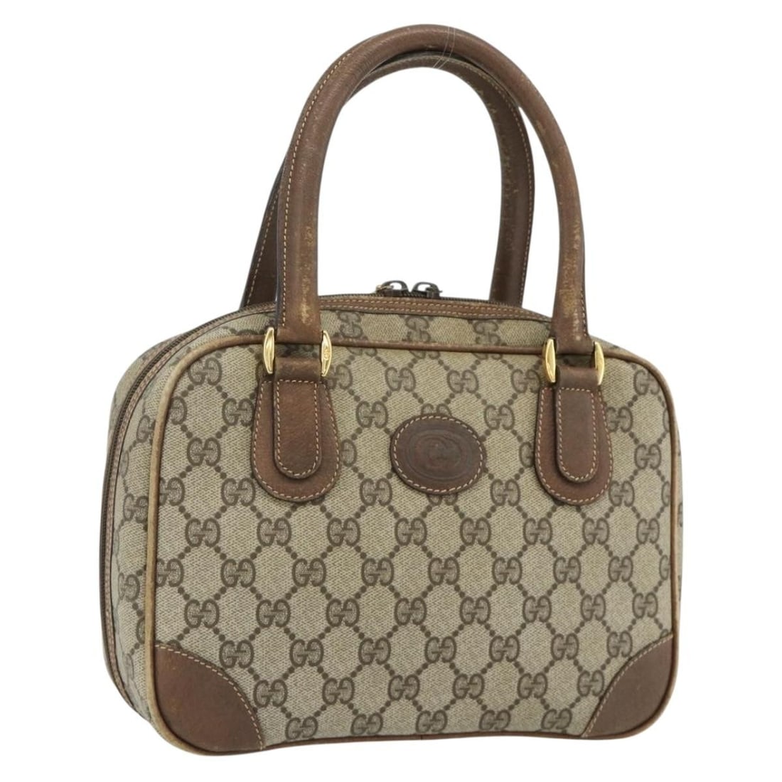 Gucci GG Canvas Beige Gold Handbag 000 58 0090 Italy: Gucci GG Canvas Beige Gold Handbag 000 58 0090 Italy This Gucci GG Supreme handbag features the iconic GG canvas in beige and gold tones. Crafted in Italy, it is designed for women and offers a compac