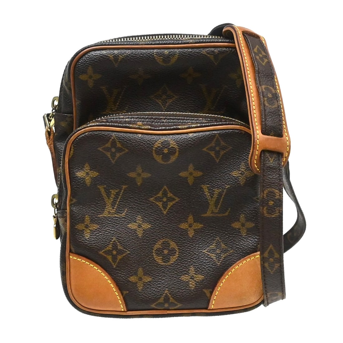 Louis Vuitton Amazone Monogram Canvas Crossbody Bag M45236: Louis Vuitton Amazone Monogram Canvas Crossbody Bag M45236 Vintage Louis Vuitton Amazon crossbody shoulder bag in Monogram canvas and leather with a zip closure and brown lining. This unisex bag shows