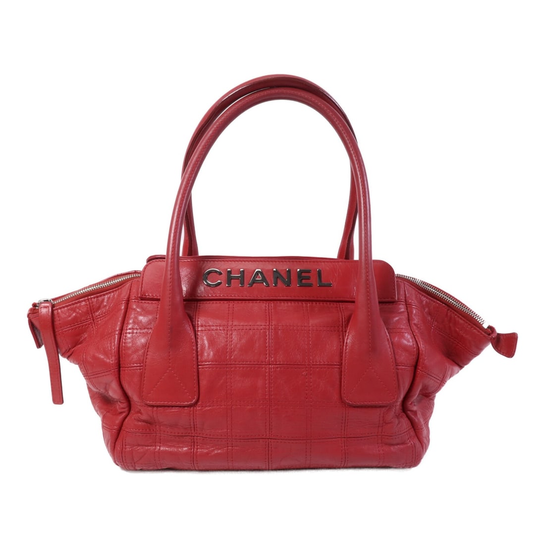 CHANEL CC Red Lambskin Handbag with Silver Tone Hardware: CHANEL CC Red Lambskin Handbag with Silver Tone Hardware CHANEL CC SHW Hand Bag in red lambskin (sheep leather) with silver-tone hardware. This women's handbag is described as being in very good AB co