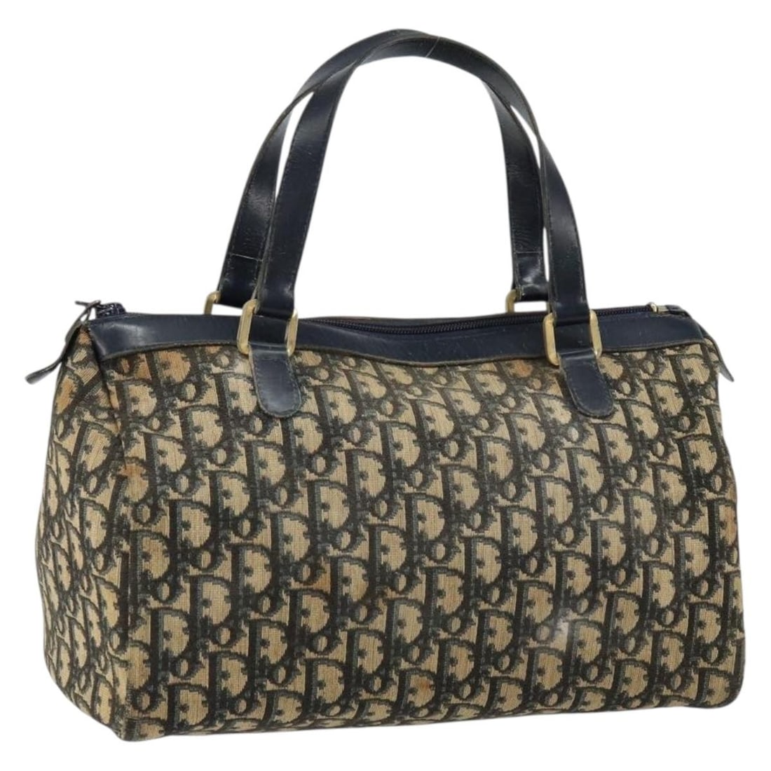 Christian Dior Boston Bag in Navy Trotter Canvas: Christian Dior Boston Bag in Navy Trotter Canvas Authentic Christian Dior Boston bag in navy Trotter canvas. This women's handbag was made in France and features a classic structured Boston bag silhou