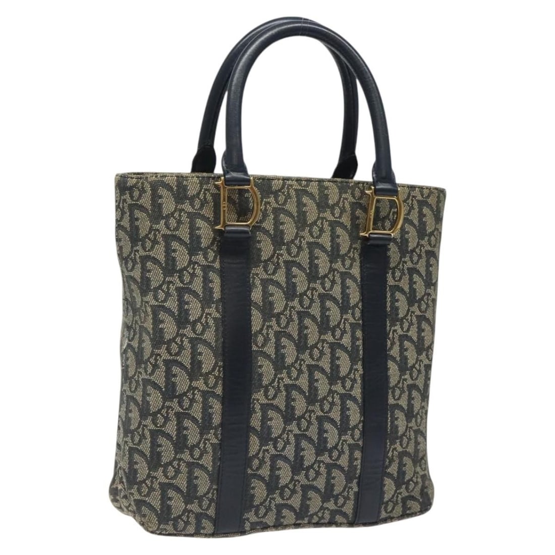 Christian Dior Navy Gold Trotter Canvas Handbag Italy: Christian Dior Navy Gold Trotter Canvas Handbag Italy Christian Dior Trotter Canvas Hand Bag in navy and gold, made in Italy. This women's handbag features Trotter Canvas exterior material and a handl