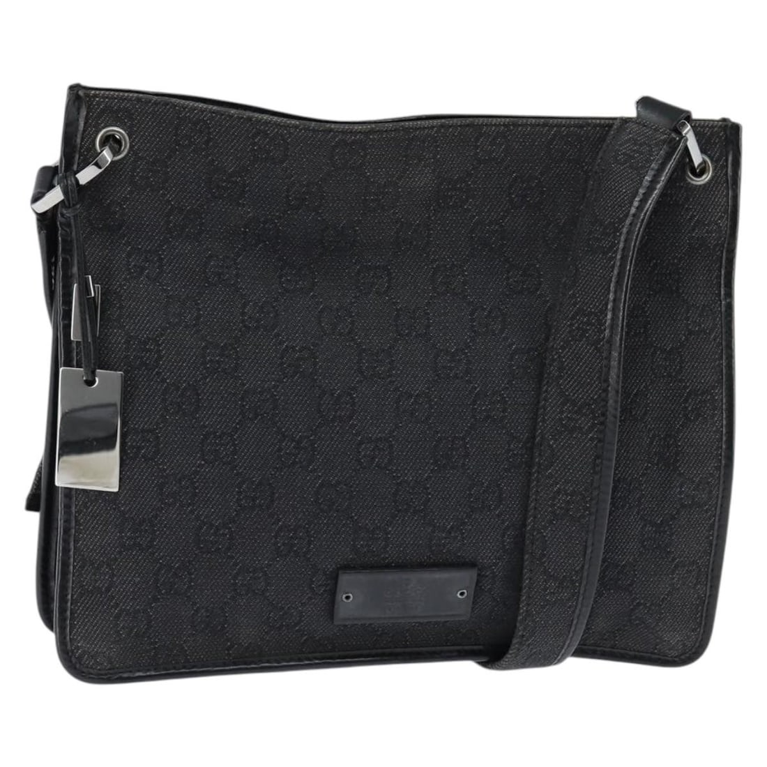 Gucci 91762 GG Canvas Shoulder Bag Black Silver Tone: Gucci 91762 GG Canvas Shoulder Bag Black Silver Tone Authentic Gucci shoulder bag in black GG canvas with silver-tone accents. This women's bag is made in Italy and features a compact profile with an 