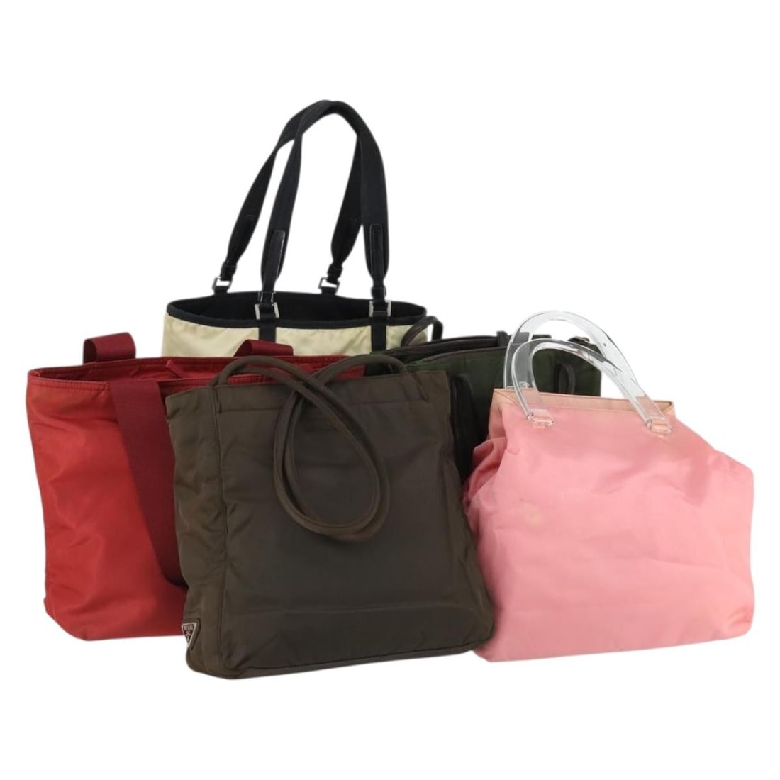 Set of 5 PRADA Nylon Handbags in Pink Cream and Khaki with Guarantee Card: Set of 5 PRADA Nylon Handbags in Pink Cream and Khaki with Guarantee Card This PRADA set includes five handbags crafted from nylon in a combination of pink, cream, and khaki colors. Made in Italy, the