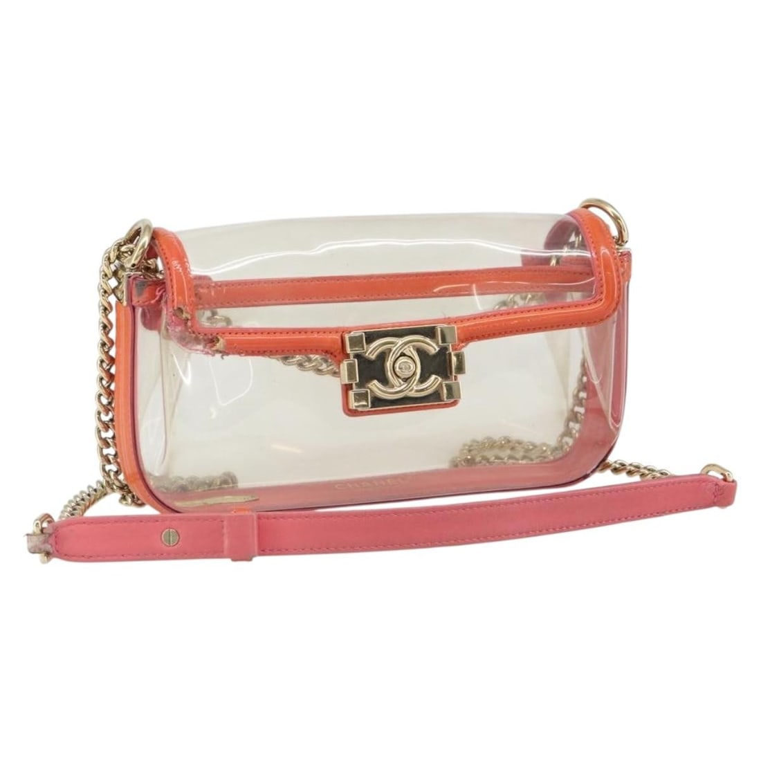 Clear Gold Vinyl Shoulder Bag CHANEL Chain CC Logo Italy: Clear Gold Vinyl Shoulder Bag CHANEL Chain CC Logo Italy This CHANEL chain shoulder bag features a clear and gold vinyl exterior with a gold-tone CC accent. Made in Italy, the bag is designed with a c