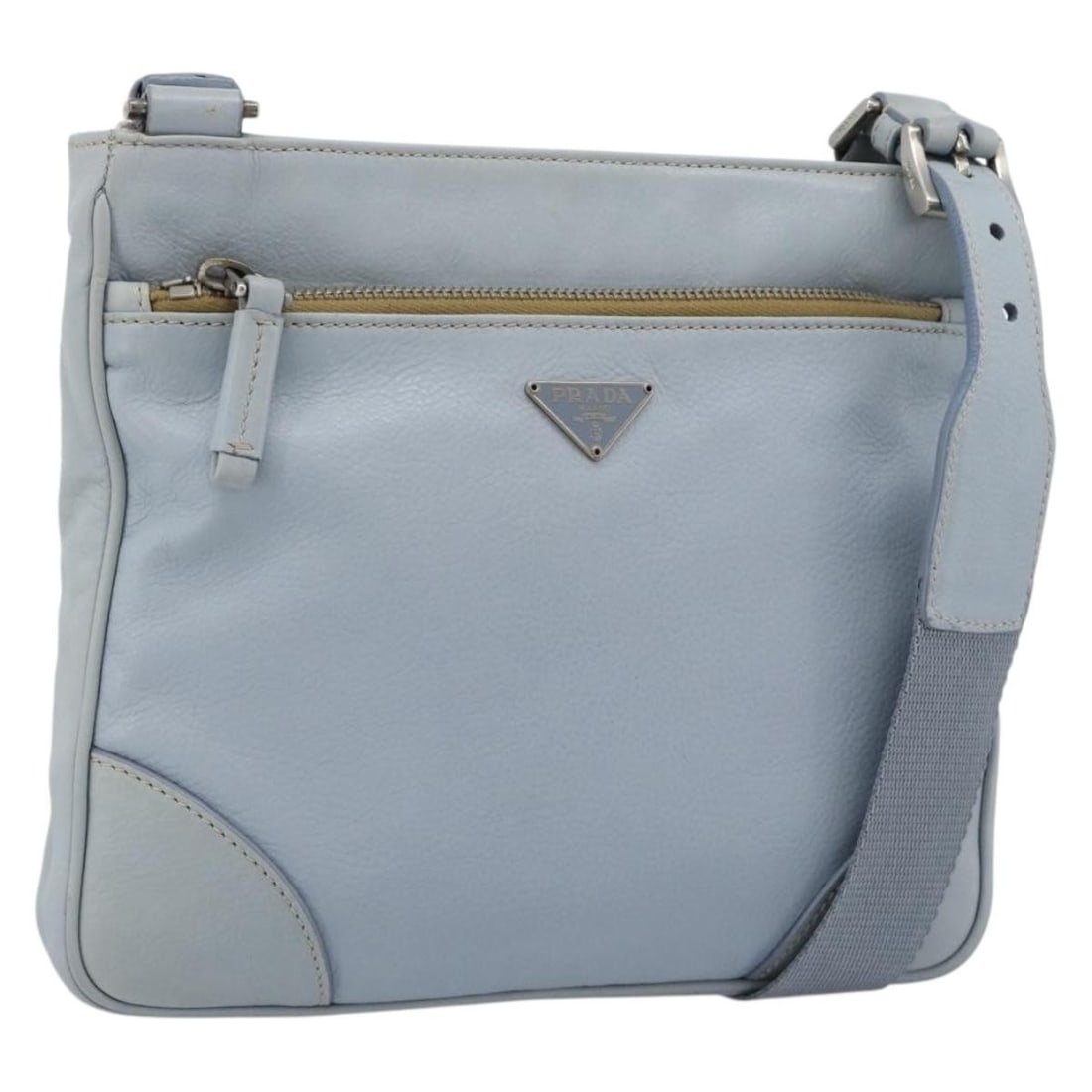 PRADA Leather Shoulder Bag in Light Blue Silver: PRADA Leather Shoulder Bag in Light Blue Silver Authentic Prada shoulder bag in light blue leather with silver-tone accents. This women's bag is made in Italy and features an adjustable shoulder strap