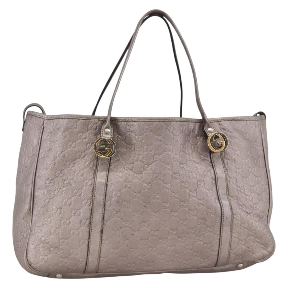Gucci Pink Silver GG Canvas Leather Tote 282956: Gucci Pink Silver GG Canvas Leather Tote 282956 This is a Gucci Miss GG Tote Bag crafted from pink and silver leather with GG canvas accents. The bag features dual top handles, a spacious interior, an