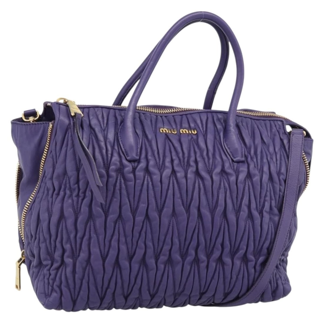 Miu Miu Purple Leather 2way Handbag with Shoulder Strap: Miu Miu Purple Leather 2way Handbag with Shoulder Strap Miu Miu hand bag in leather with a purple and gold color scheme. This 2-way style comes with a shoulder strap and was made in Turkey. It measure