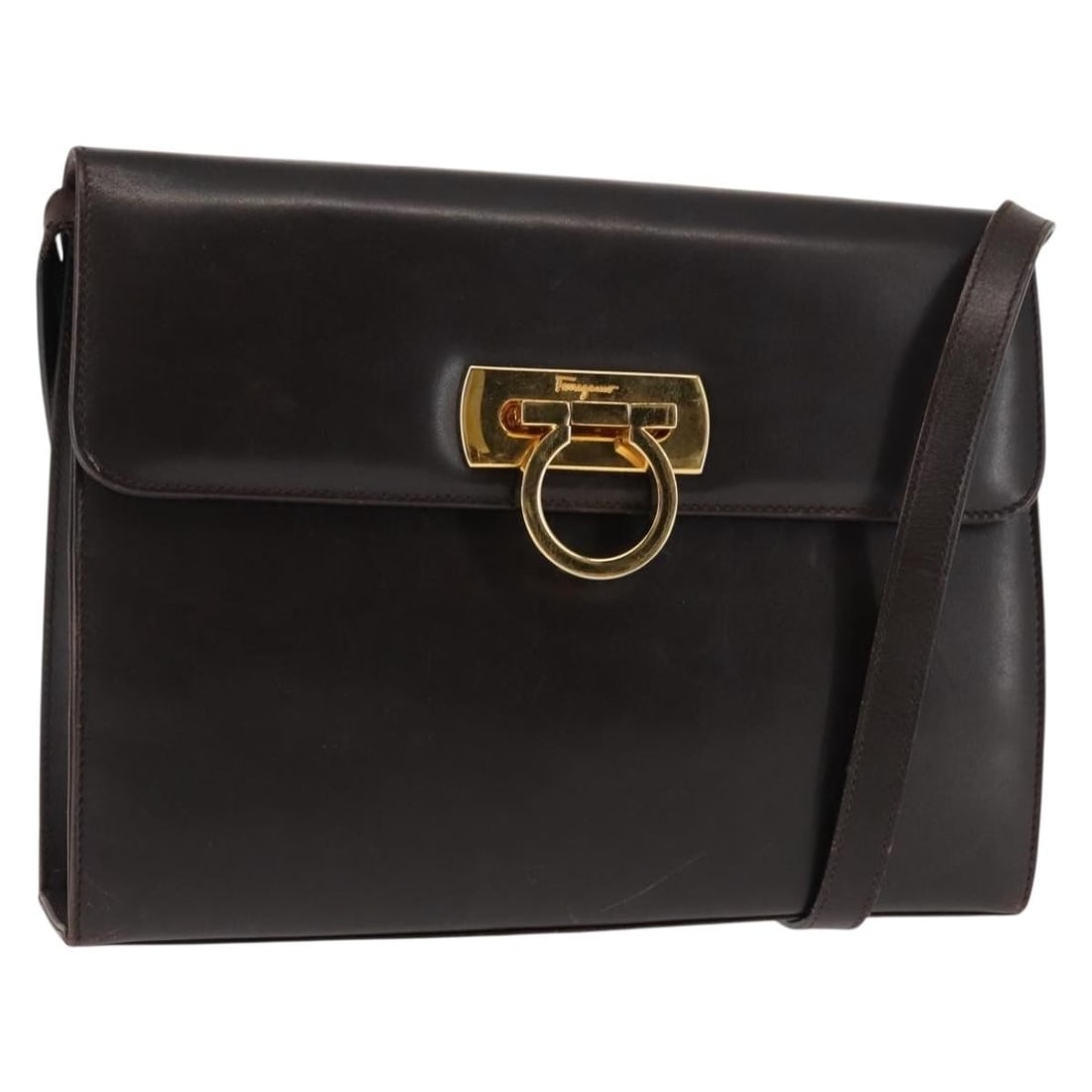 Salvatore Ferragamo Gancini Brown Leather Shoulder Bag Italy: Salvatore Ferragamo Gancini Brown Leather Shoulder Bag Italy This Salvatore Ferragamo Gancini Shoulder Bag is crafted from high-quality brown leather, showcasing the brand's renowned Italian craftsman