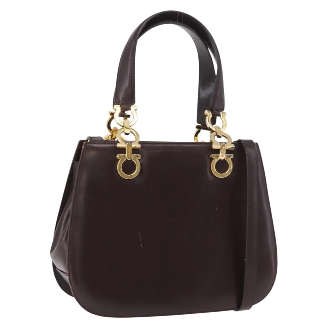 Salvatore Ferragamo Gancini Brown Leather Handbag with Shoulder Strap: Salvatore Ferragamo Gancini Brown Leather Handbag with Shoulder Strap Salvatore Ferragamo Gancini handbag in brown leather with gold-tone accents. Made in Italy, this women's handbag includes a should