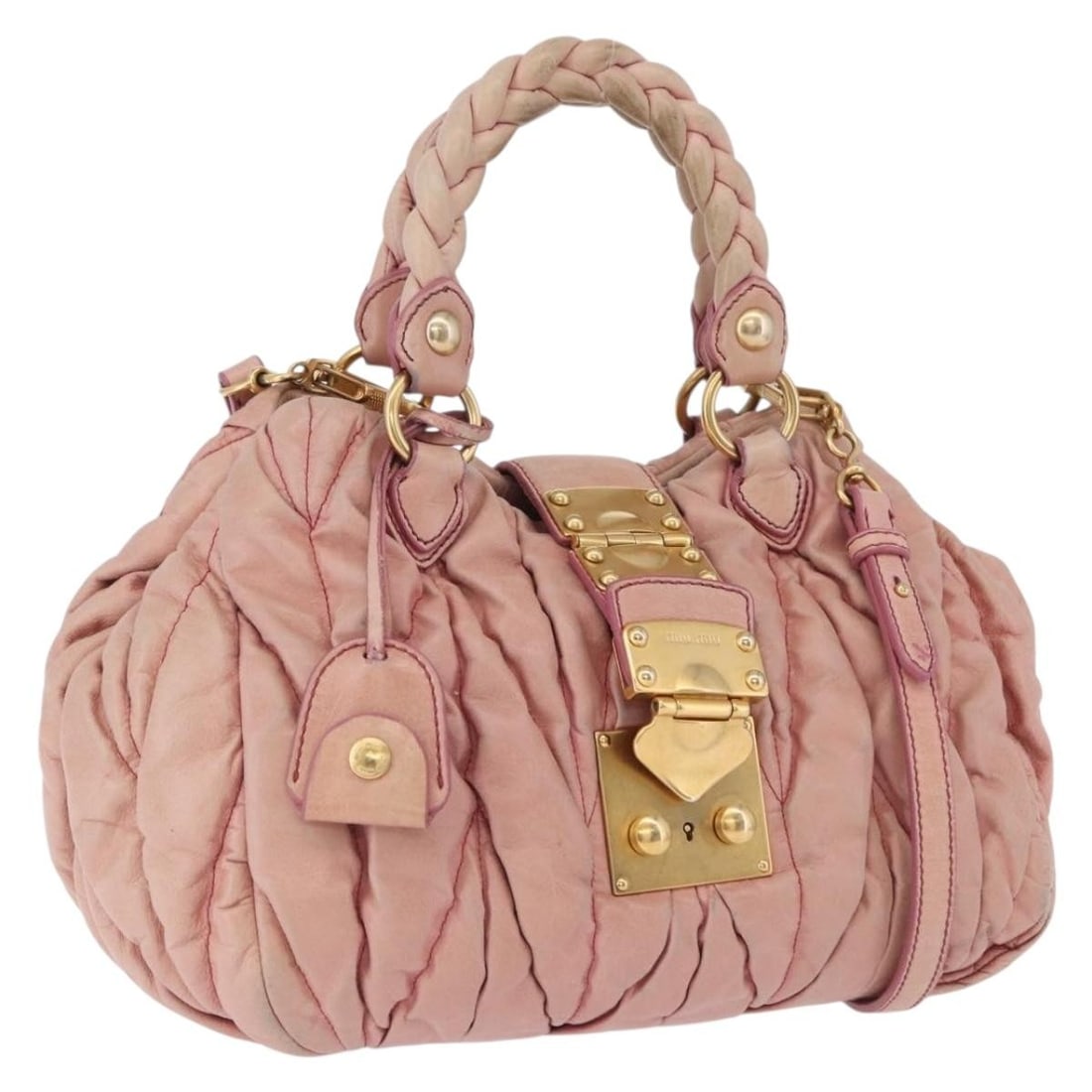 Miu Miu Matelasse Vitellolux 2way Leather Handbag Pink Gold Tone: Miu Miu Matelasse Vitellolux 2way Leather Handbag Pink Gold Tone Miu Miu matelasse Vitellolux 2-way handbag in pink leather with gold tone accents. This women's handbag includes two keys, a clochette,