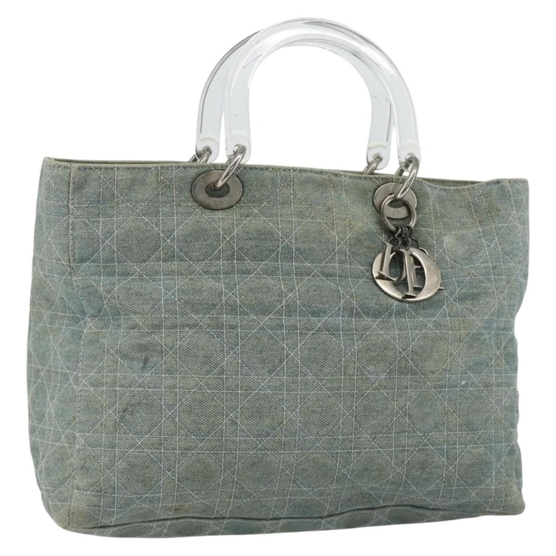 Christian Dior Cannage canvas handbag blue silver charm Italy: Christian Dior Cannage canvas handbag blue silver charm Italy Christian Dior Cannage handbag in blue canvas with silver-tone accents. Made in Italy, this women's handbag includes a charm accessory. Co